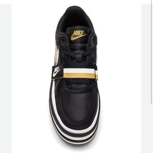 Nike Women’s Black White and Gold Strap Sneakers